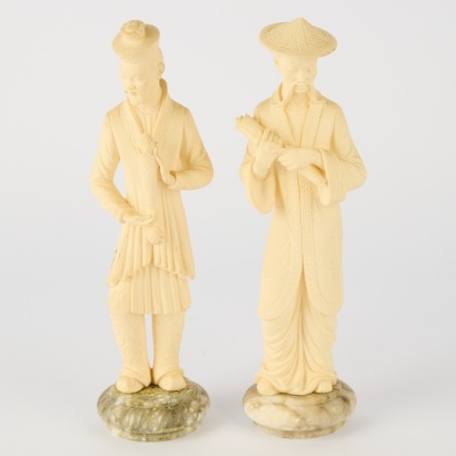 A Pair of A. Giannelli Resin Sculptures with Marble Bases