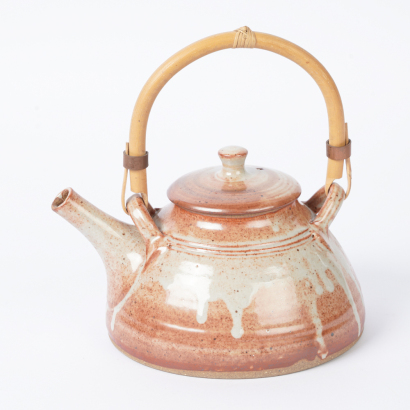 A Peter Stichbury Shino Glaze Teapot with Cane Handle
