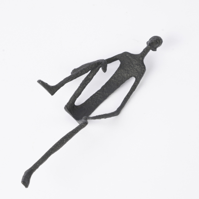 A Black Metal Human Figure Table Ornament