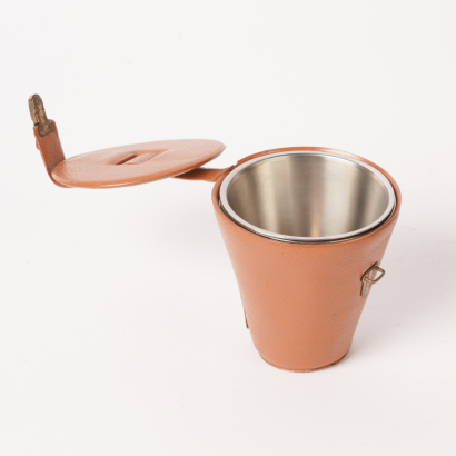 A Set of Four Stainless Steel Travel Cups in a Pouch
