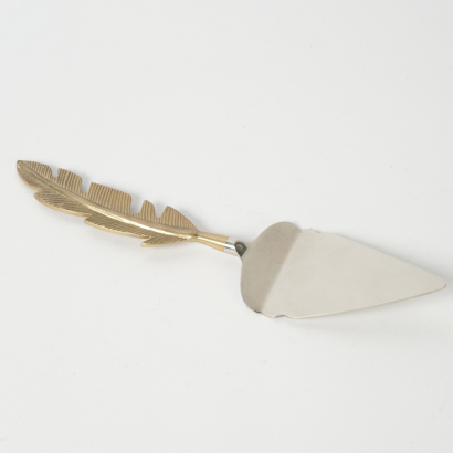 A Brass Feather Cake Lifter