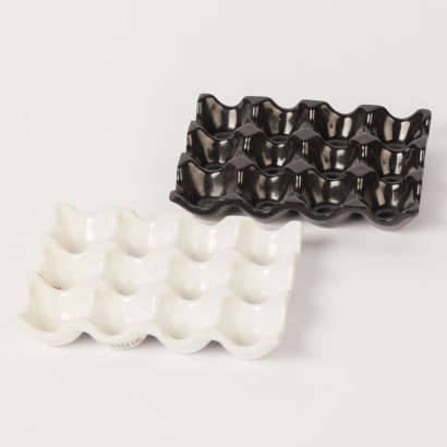 A Pair of Ceramic Egg Holders