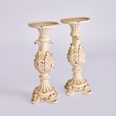 A Pair Of Ornate Candle Holders