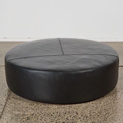 A Large "Puck" Leather Ottoman from Camerich