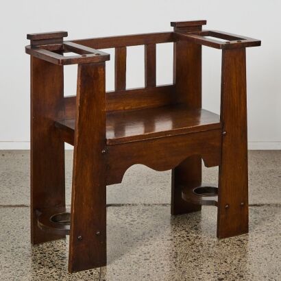 An Arts and Crafts Oak Entrance Seat and Umbrella Stand