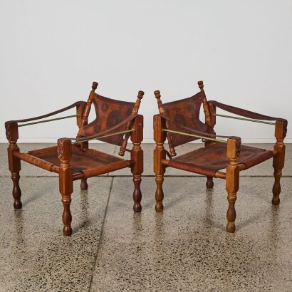A Pair of Portuguese Leather Sling Back Chairs