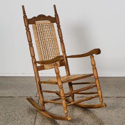 A Vintage American Rocking Chair with Rush seat and Woven Back