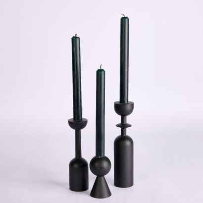 A trio of Wooden Black Post Modern Candle Holders