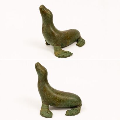 A Vintage Patinated Brass Seal Sculpture