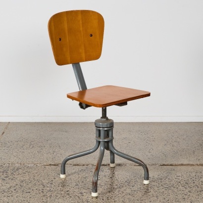A Vintage Industrial Swivel Chair