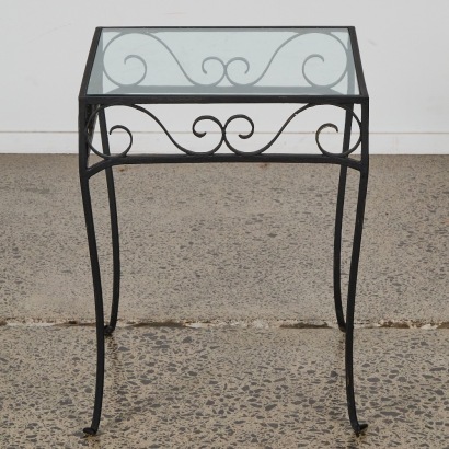 A Wrought Iron And Glass Side Table