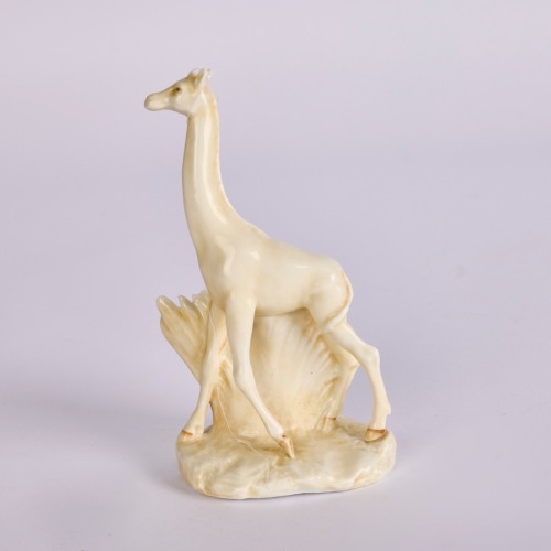 An Antique Porcelain Giraffe Figure