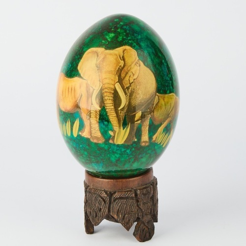 A Hand-Decorated South African Ostrich Egg with Base