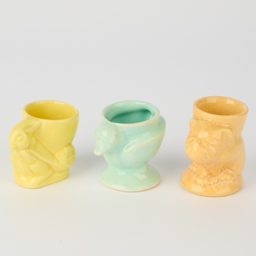 A Set of Three Crown Lynn Animal Egg Cups