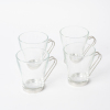 A Set of Four Italian Glass and Stainless Cappucino Cups