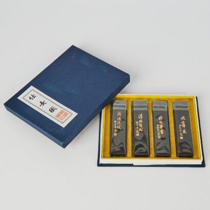 A Box of Four Chinese 20th Century 'Attendants' Ink Sticks
