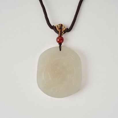 A Chinese White Jade 'Dragon' Pendant
