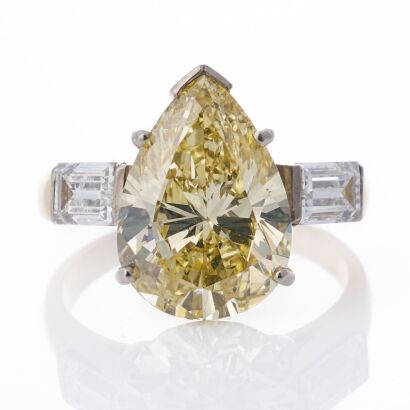 18ct Yellow / White Gold, 5.00ct Fancy Yellow Pear Shape / .89ct Baguette Cut Diamond Ring