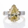 18ct Yellow / White Gold, 5.00ct Fancy Yellow Pear Shape / .89ct Baguette Cut Diamond Ring