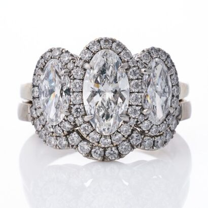 An Important, 18ct White Gold, 1.12ct Moval Cut / 1.05ct Moval / 0.36ct Diamond Ring - GIA certified / 0.24ct Diamond Band