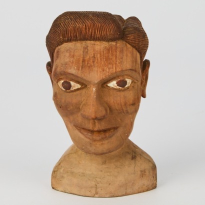 A Hand Carved Vintage Bust