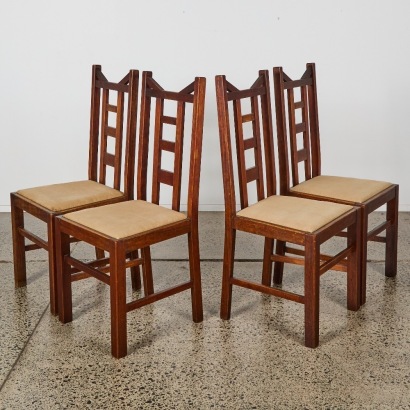 A Set of Four Arts & Crafts Revival Dining Chairs