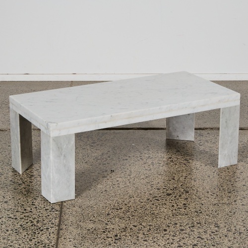 An Italian Marble Coffee Table with Prismatic Supports