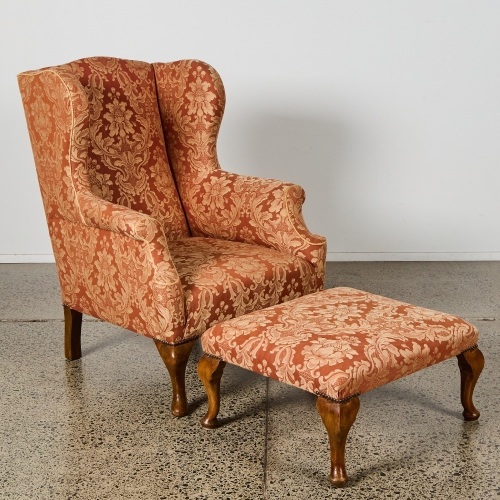 An Antique Style Wingback Armchair and Footstool