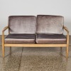 A Mid-Century Style Scandinavian Sculpted-Timber and Velvet Settee
