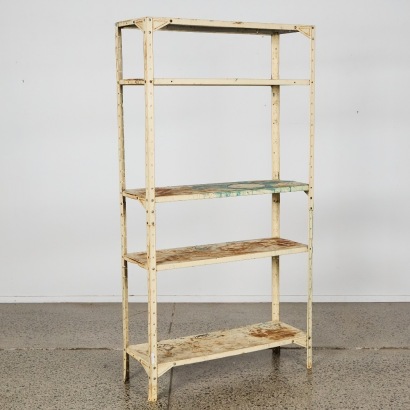 A Vintage Industrial Riveted-Steel Shelving Unit