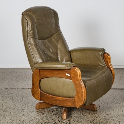 A Vintage Scandinavian Oak-Framed Leather Swivel Recliner
