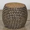 A Large Round Metal Bobbin Table