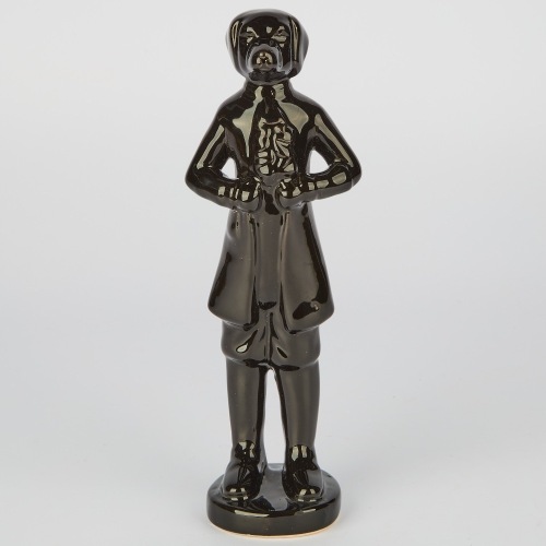 A Black Ceramic Standing Dog Ornament