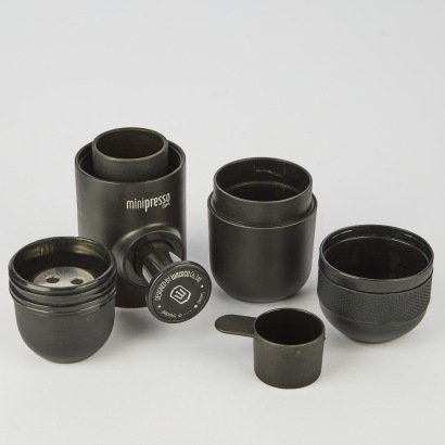 A Wacaco Minipresso GR Portable Coffee Maker