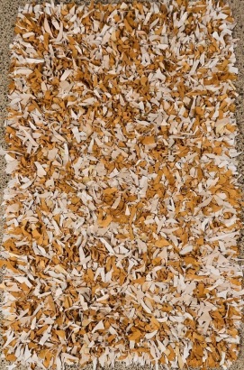 A Leather Shag Rug Beige and Brown Leather