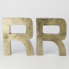 A Pair of Metal Letter "R" Wall Signs