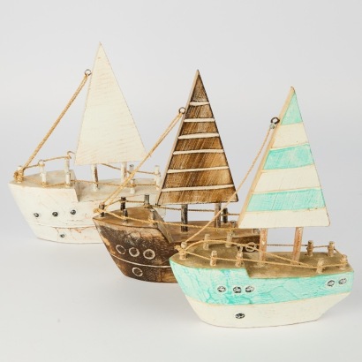 A Trio of Three Wooden Coastal Boats