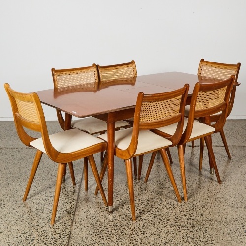 A Jon Jansen Table and Six Chairs