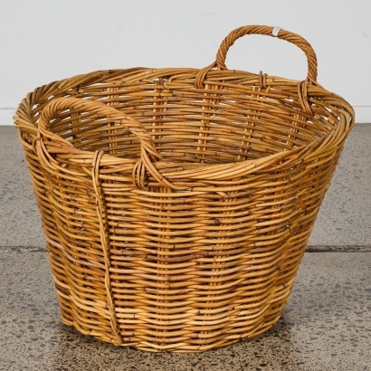 A Large Vintage Woven Wicker Basket with Handles