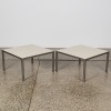 A Pair of Steel and Ceramic Tile Top Tables