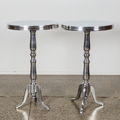 A Pair of Cast Polished Aluminium Wine Tables