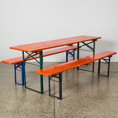 An Orange Vintage Folding Table and Bench Seat Set