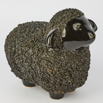 An Ceramic Black Ceramic Sheep Statue