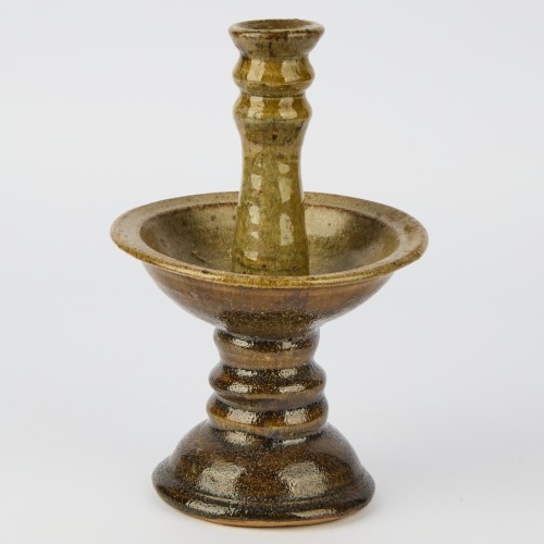 An Yvonne Rust Candlestick