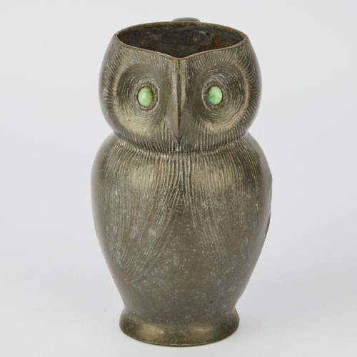 A Tudric Pewter Owl Jug by Archibald Knox for Liberty and Co, 1930s