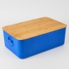 A Blue BODUM Bistro Bread Box with Cutting Board/Bamboo Lid
