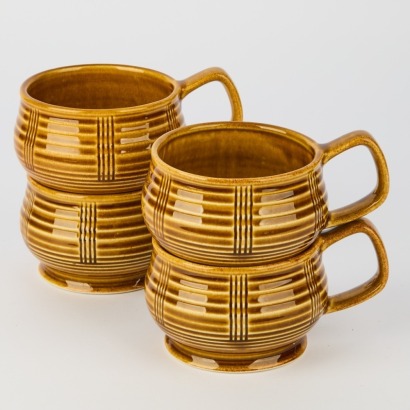 A Set of Four Crown Lynn Honeyglaze Mugs