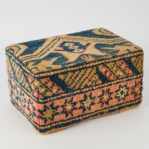 An Antique Kilim covered Footstool