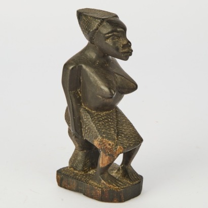 A Vintage Hand Carved Ebony African Woman Figure