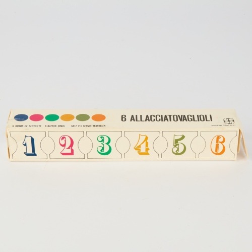 A set of six Guzzini Fratelli Allacciatovaglioli Clear Plastic Napkin Rings